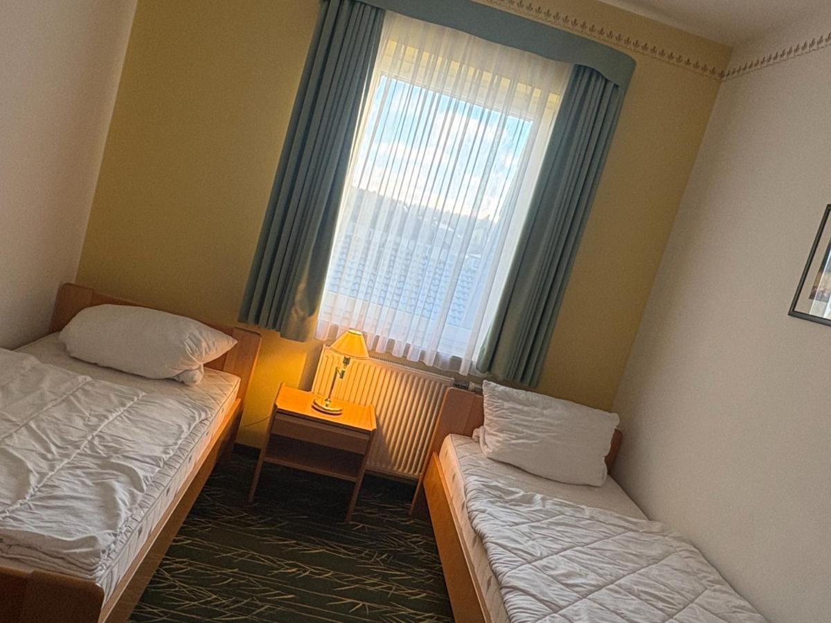 Ein Bett oder Betten in einem Zimmer der Unterkunft Kaiserhof Feldberg by Belvilla Resorts