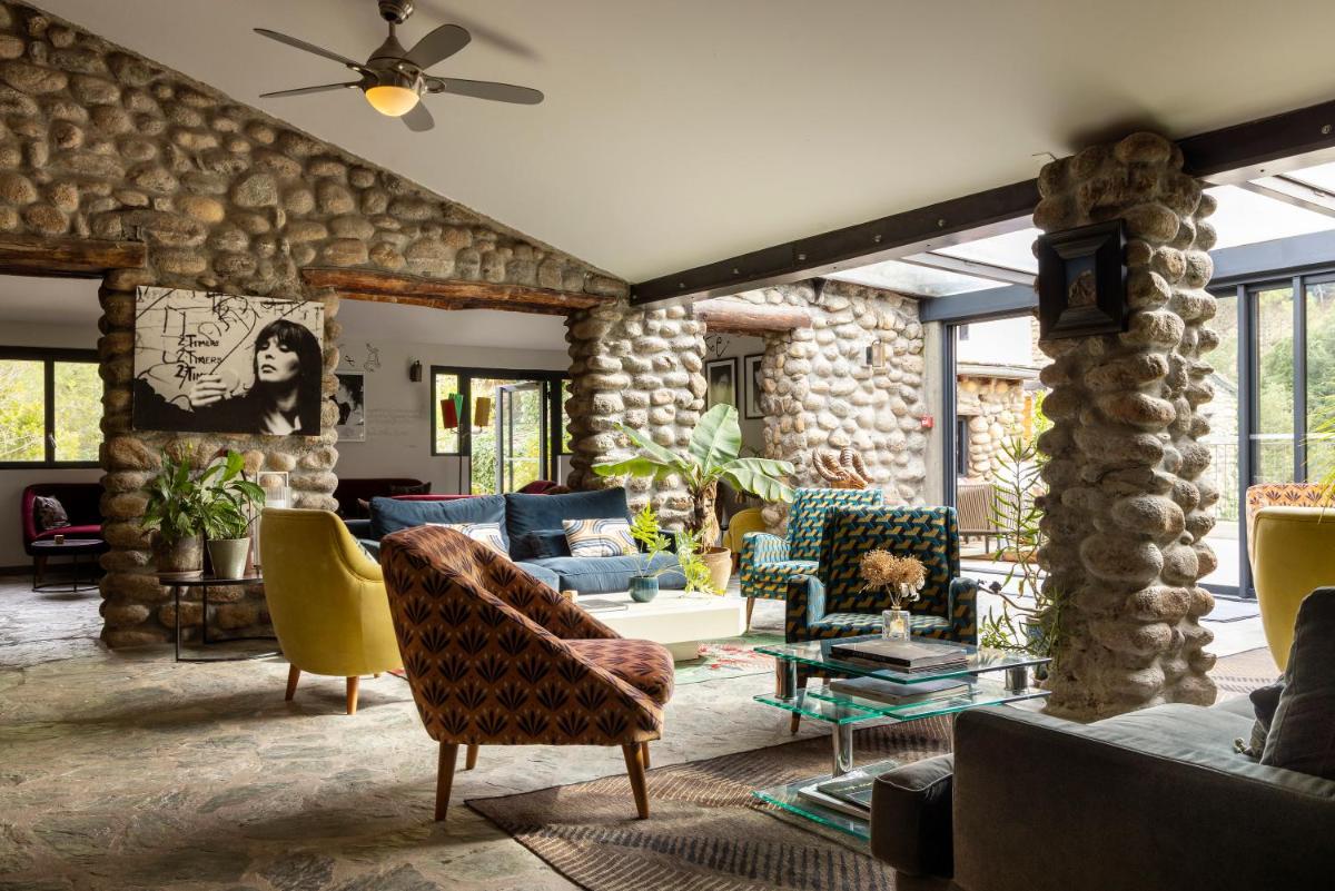 Coin salon dans l'établissement Hotel E Caselle - Demeures & Châteaux