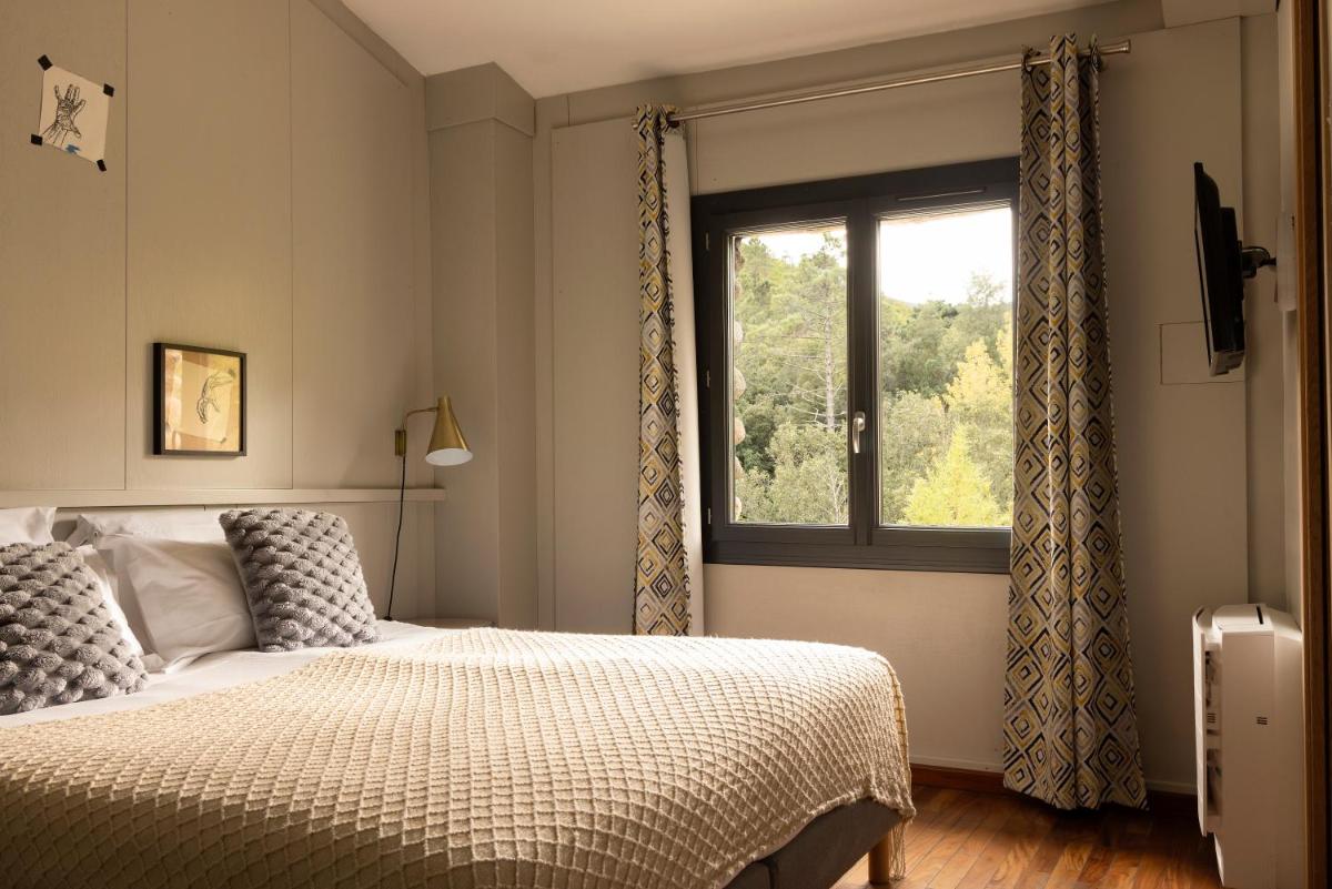Un ou plusieurs lits dans un hébergement de l'établissement Hotel E Caselle - Demeures & Châteaux
