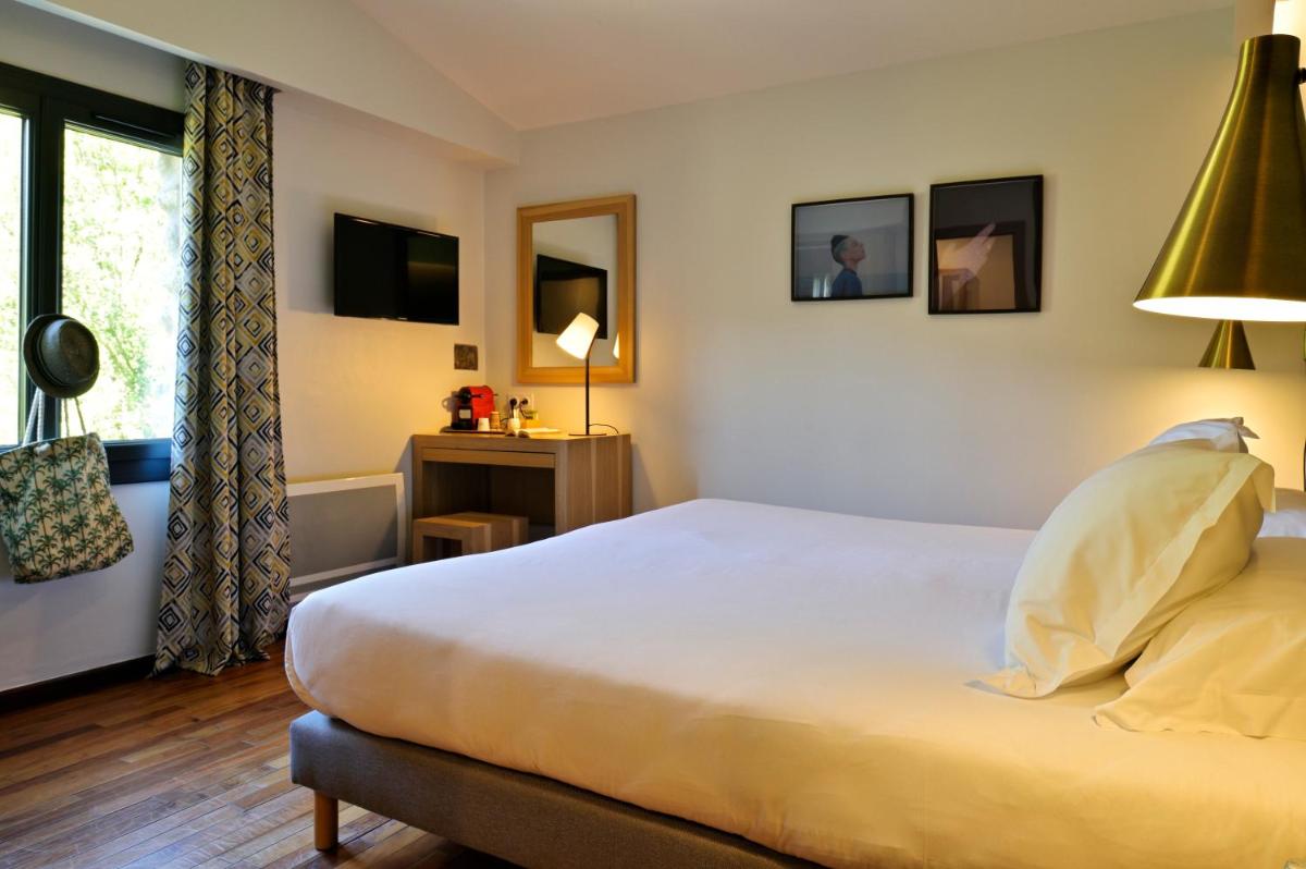 Un ou plusieurs lits dans un hébergement de l'établissement Hotel E Caselle - Demeures & Châteaux