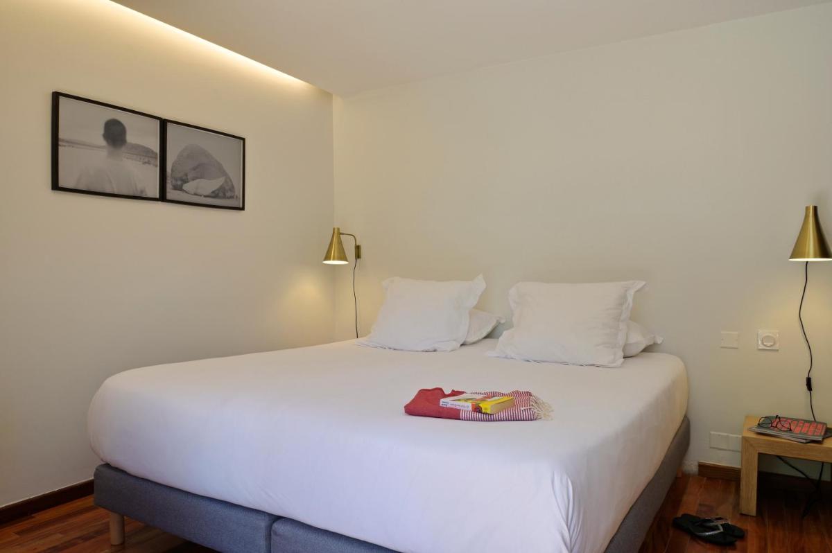 Un ou plusieurs lits dans un hébergement de l'établissement Hotel E Caselle - Demeures & Châteaux