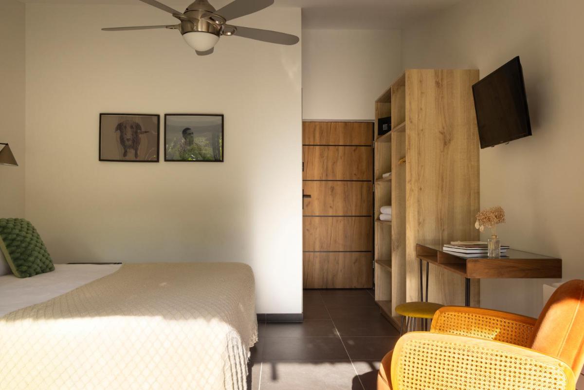 Un ou plusieurs lits dans un hébergement de l'établissement Hotel E Caselle - Demeures & Châteaux