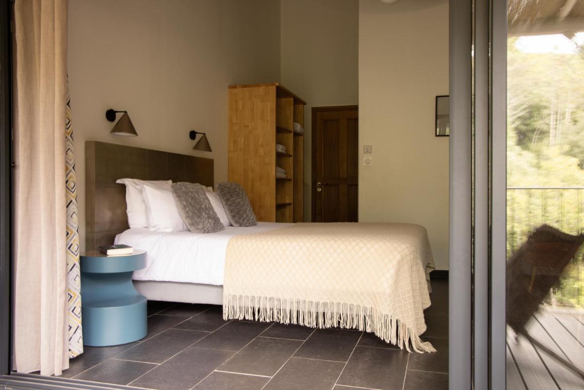 Un ou plusieurs lits dans un hébergement de l'établissement Hotel E Caselle - Demeures & Châteaux