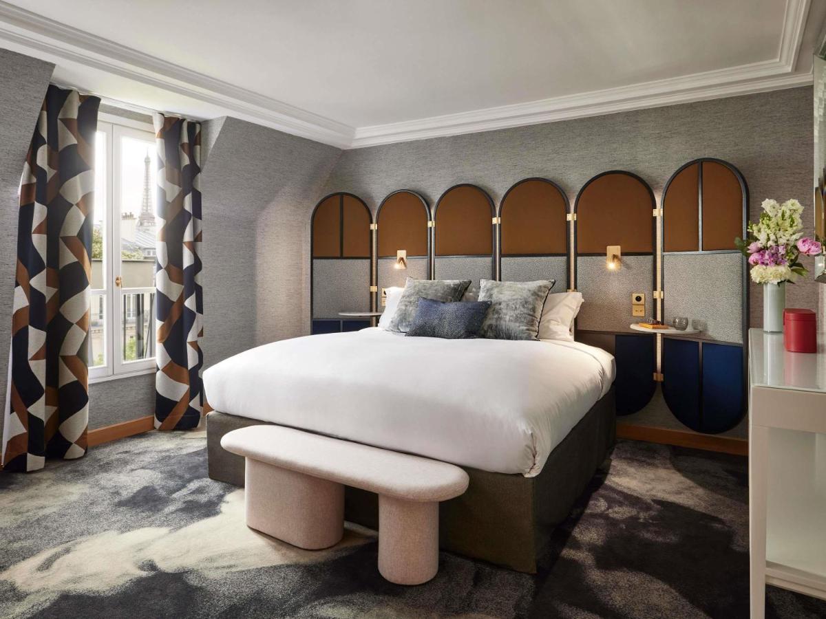 Un ou plusieurs lits dans un hébergement de l'établissement Sofitel Paris Baltimore Tour Eiffel