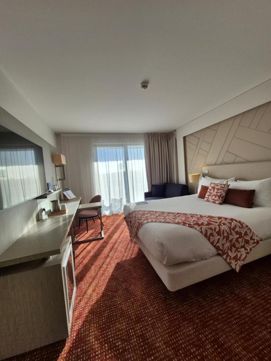 Un ou plusieurs lits dans un hébergement de l'établissement Thalazur Cabourg - Hôtel & Spa