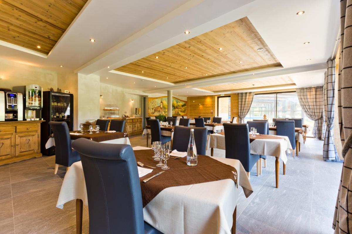 Restaurant ou autre lieu de restauration dans l'établissement Hotel Alpina