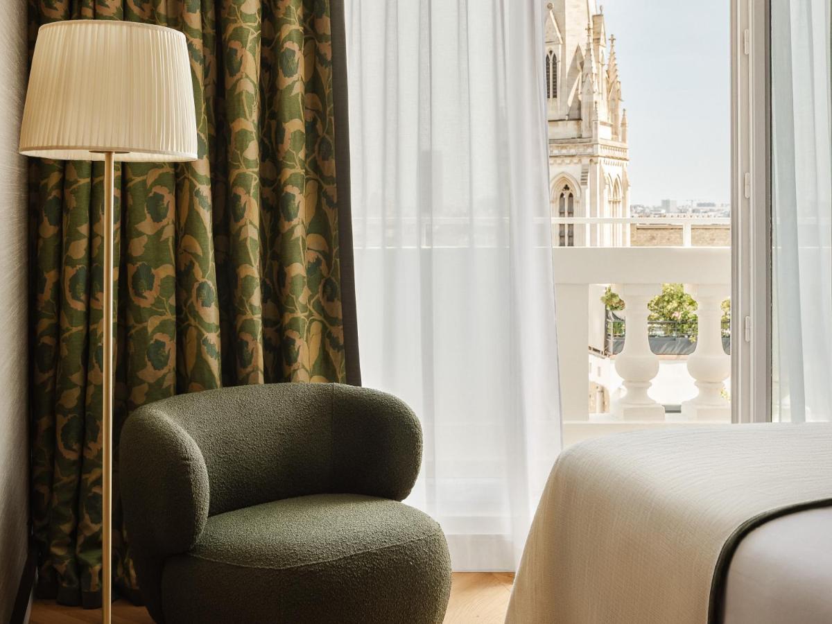 Coin salon dans l'établissement Hôtel De Sers Champs Elysées Paris