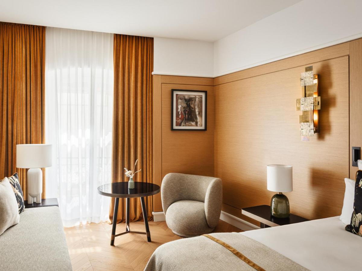 Un ou plusieurs lits dans un hébergement de l'établissement Hôtel De Sers Champs Elysées Paris