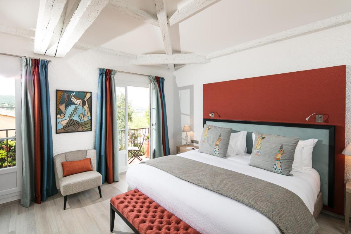 Un ou plusieurs lits dans un hébergement de l'établissement Hotel Byblos Saint-Tropez
