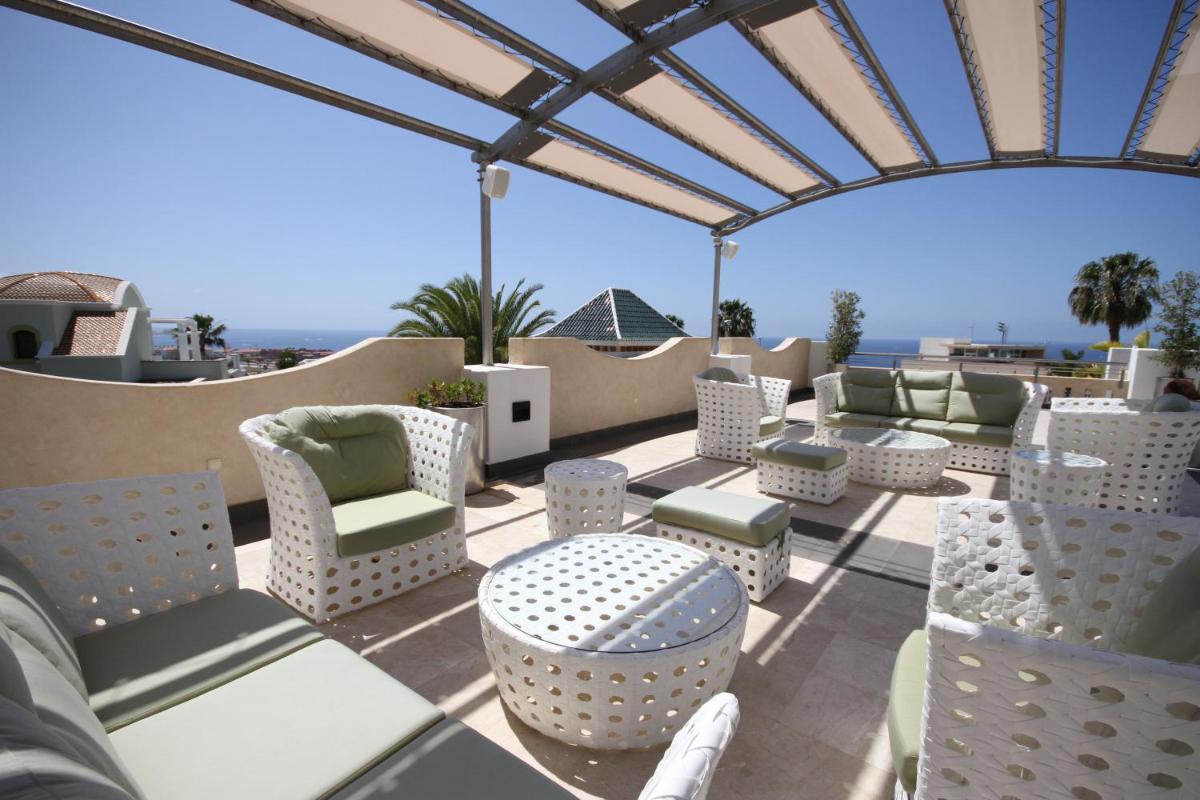 Zona de estar de Hotel Suite Villa Maria