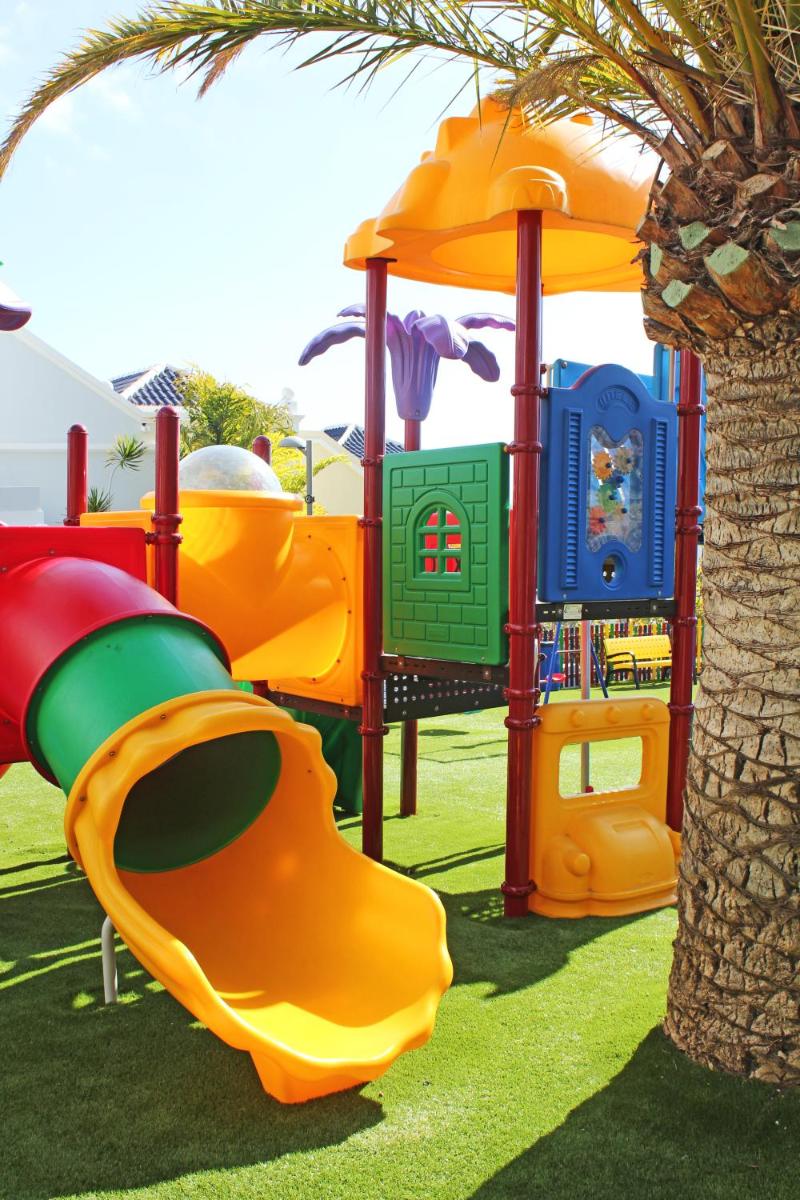 Zona de juegos infantil en Hotel Suite Villa Maria