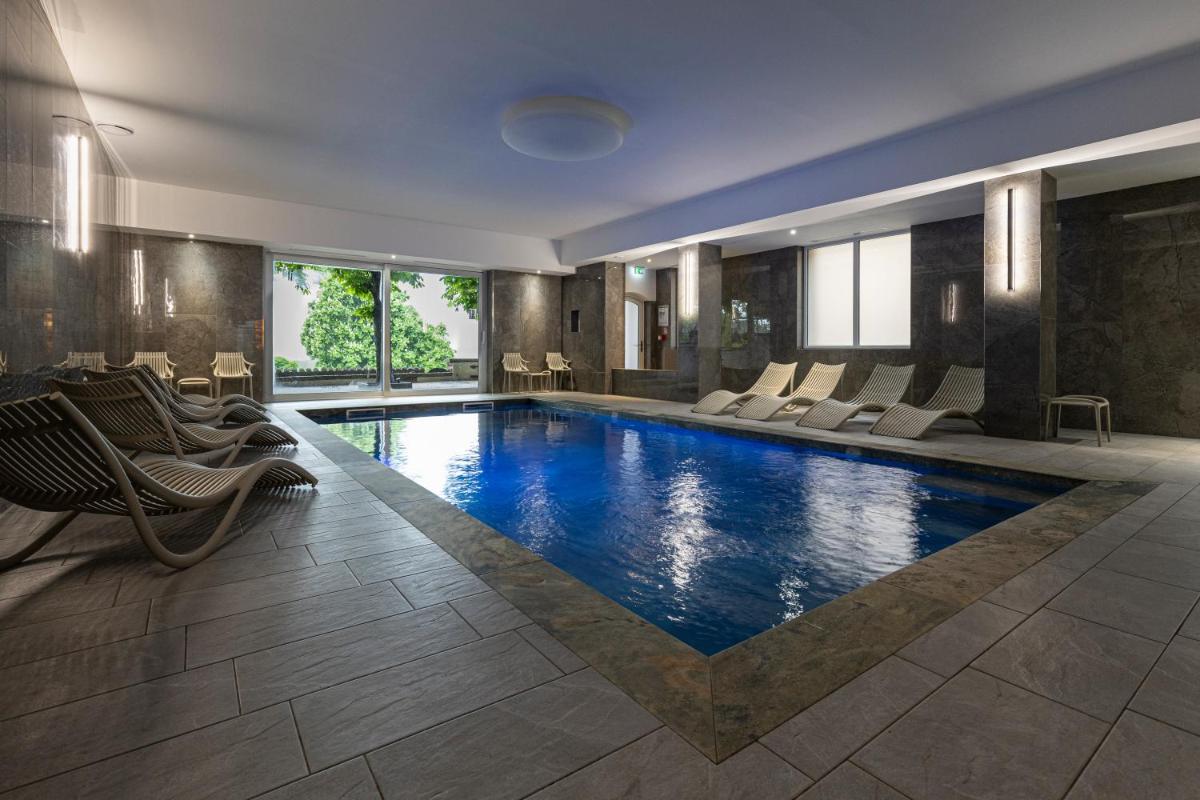 Piscine de l'établissement Hotel Munsch Restaurant & Wellness, Colmar Nord - Haut-Koenigsbourg ou située à proximité