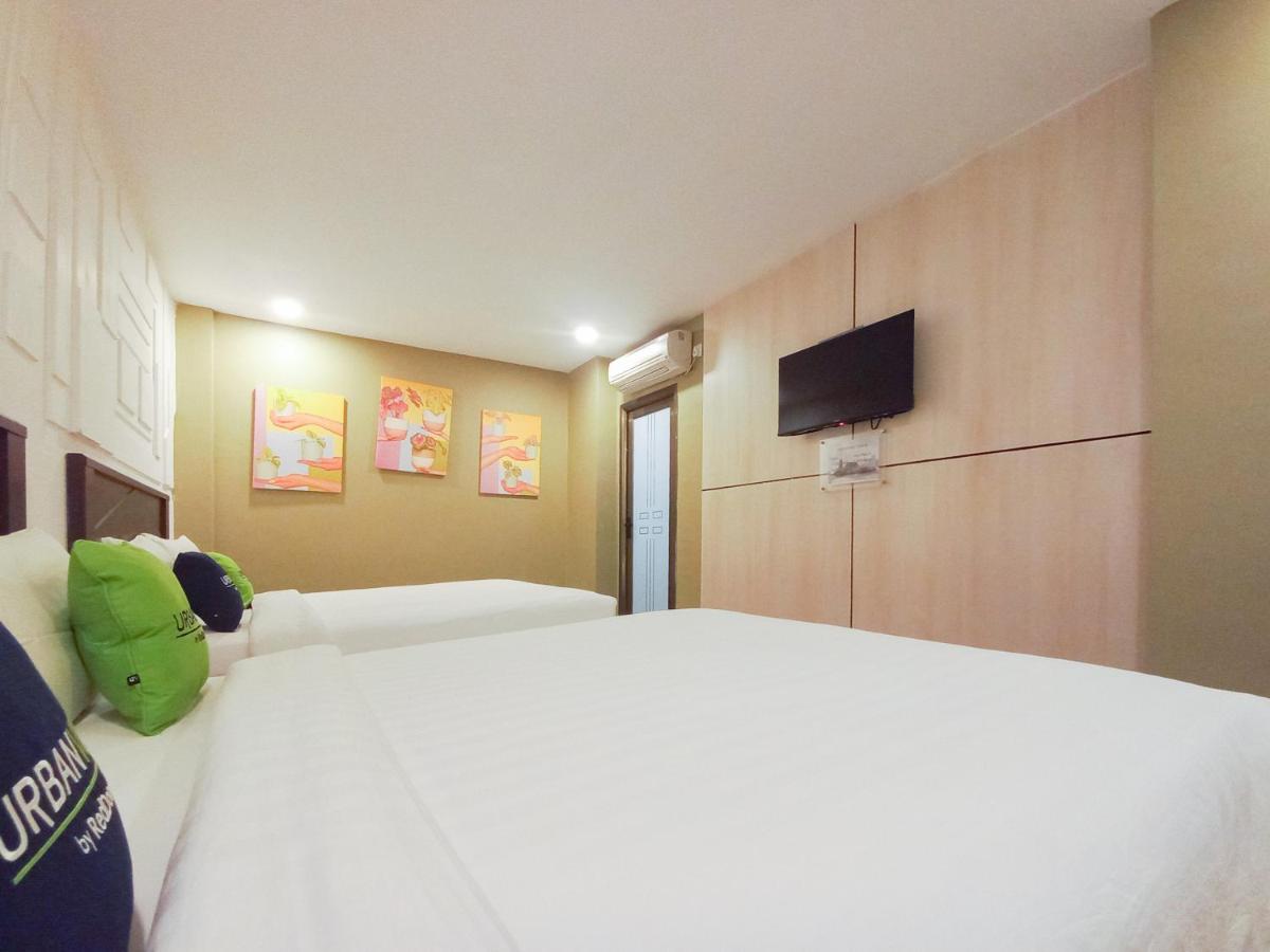 Urbanview Hotel X Ten Harbour Bay Batam - Housity