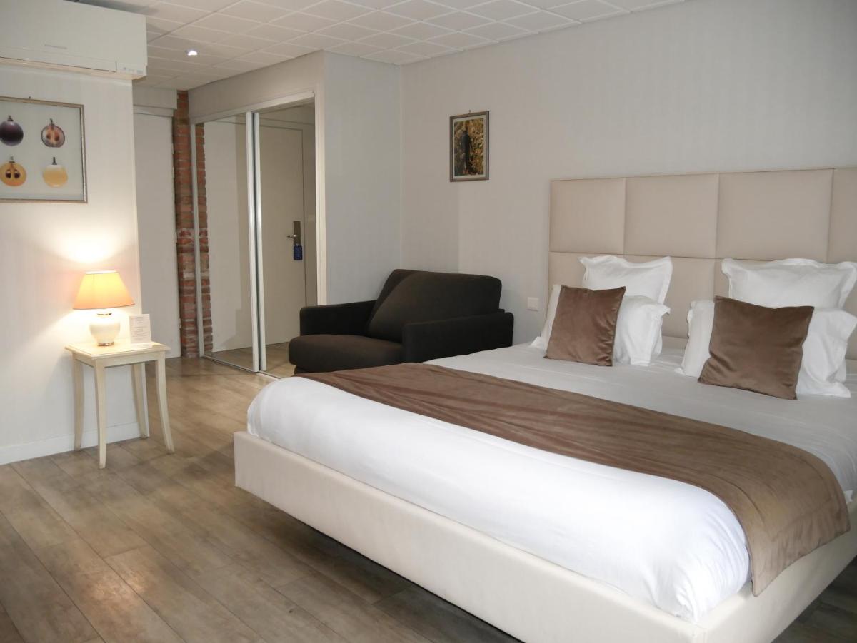 Un ou plusieurs lits dans un hébergement de l'établissement Auberge du Lac, Sure Hotel Collection by Best Western