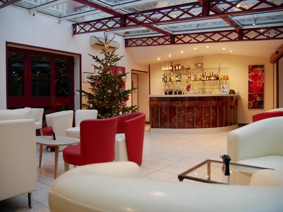 Coin salon dans l'établissement Auberge du Lac, Sure Hotel Collection by Best Western
