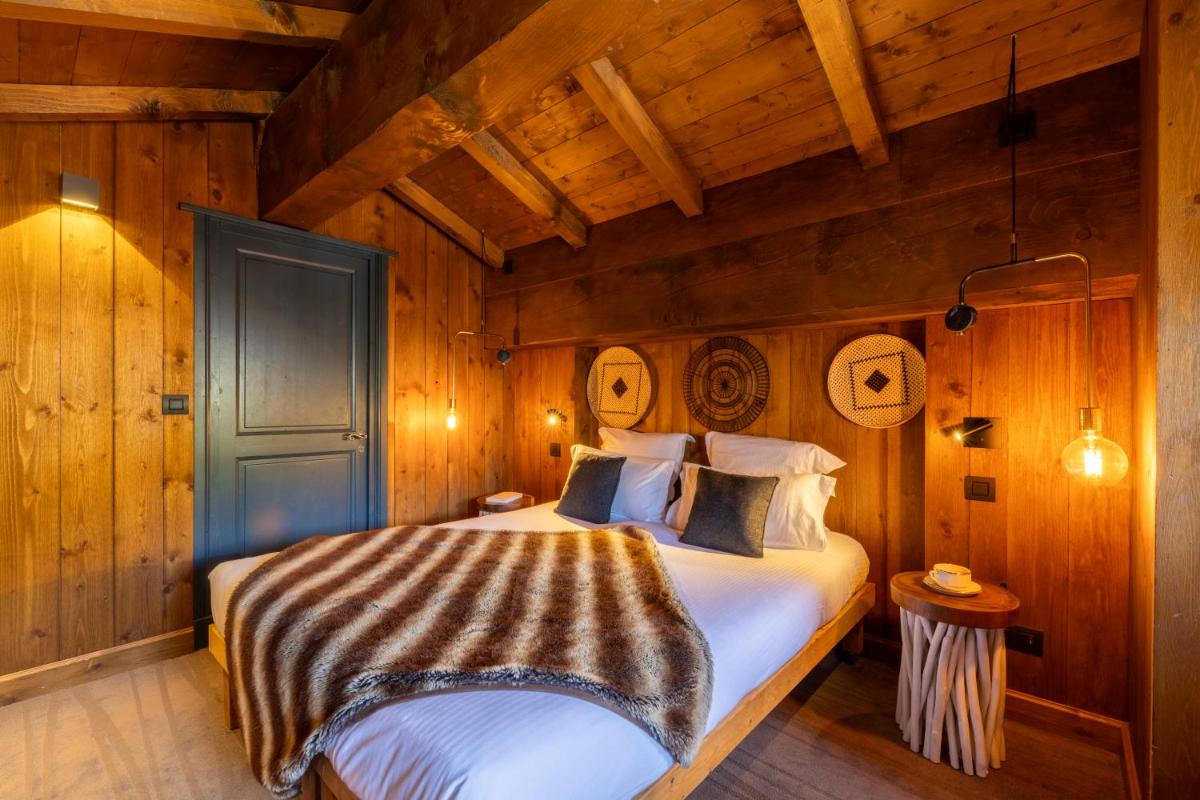 Un ou plusieurs lits dans un hébergement de l'établissement Hôtel Village Montana by Les Etincelles