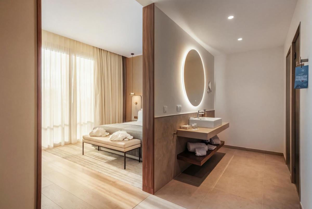 Uma cama ou camas num quarto em AP Lago Montargil - Conference & SPA