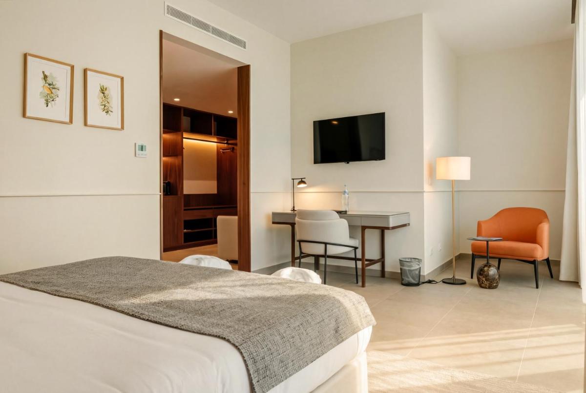 Uma cama ou camas num quarto em AP Lago Montargil - Conference & SPA