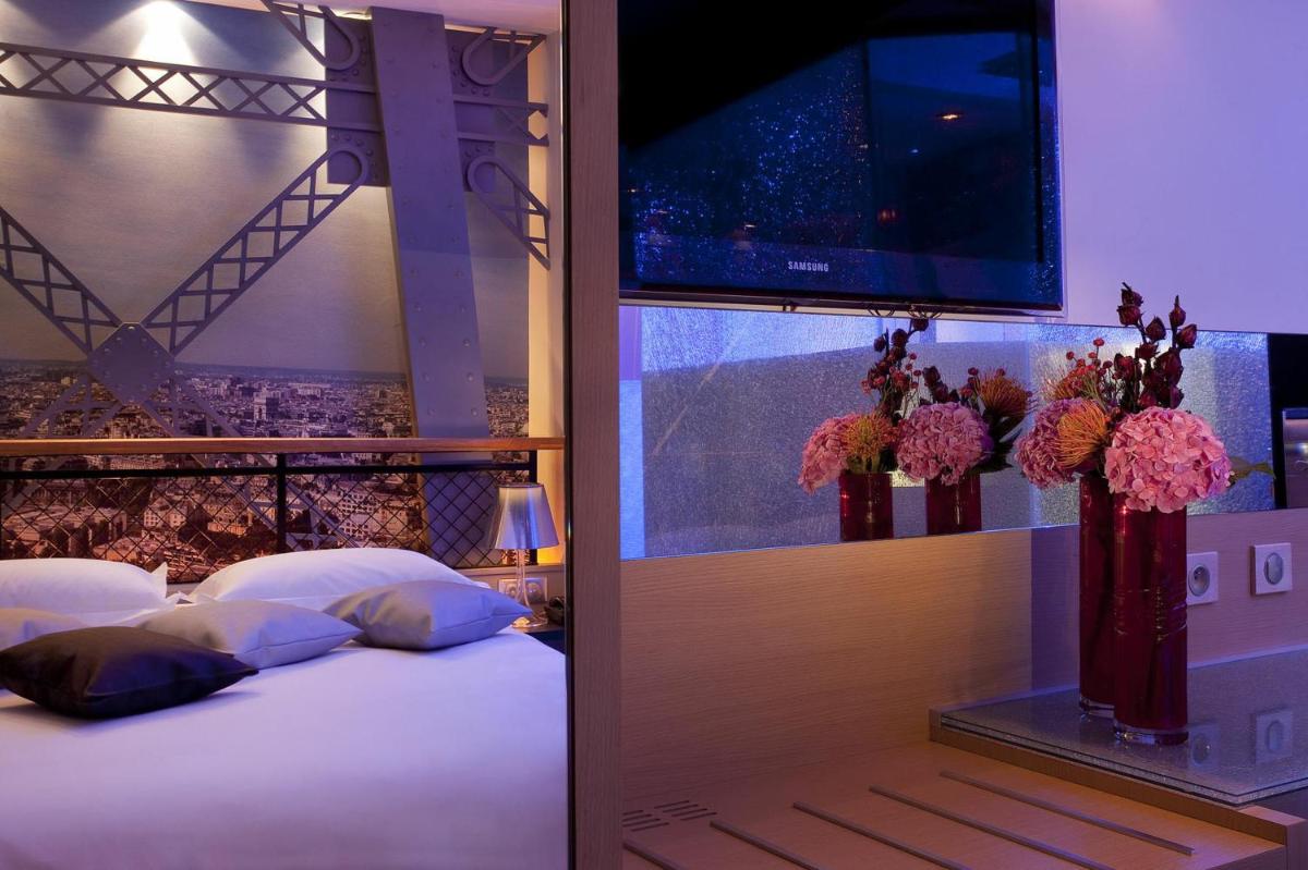 Un ou plusieurs lits dans un hébergement de l'établissement Secret de Paris - Hotel & Spa