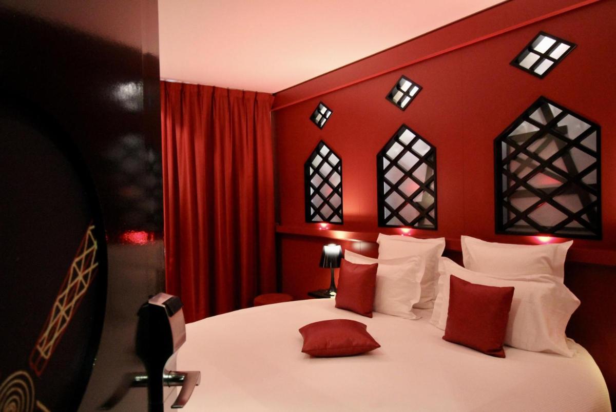 Un ou plusieurs lits dans un hébergement de l'établissement Secret de Paris - Hotel & Spa