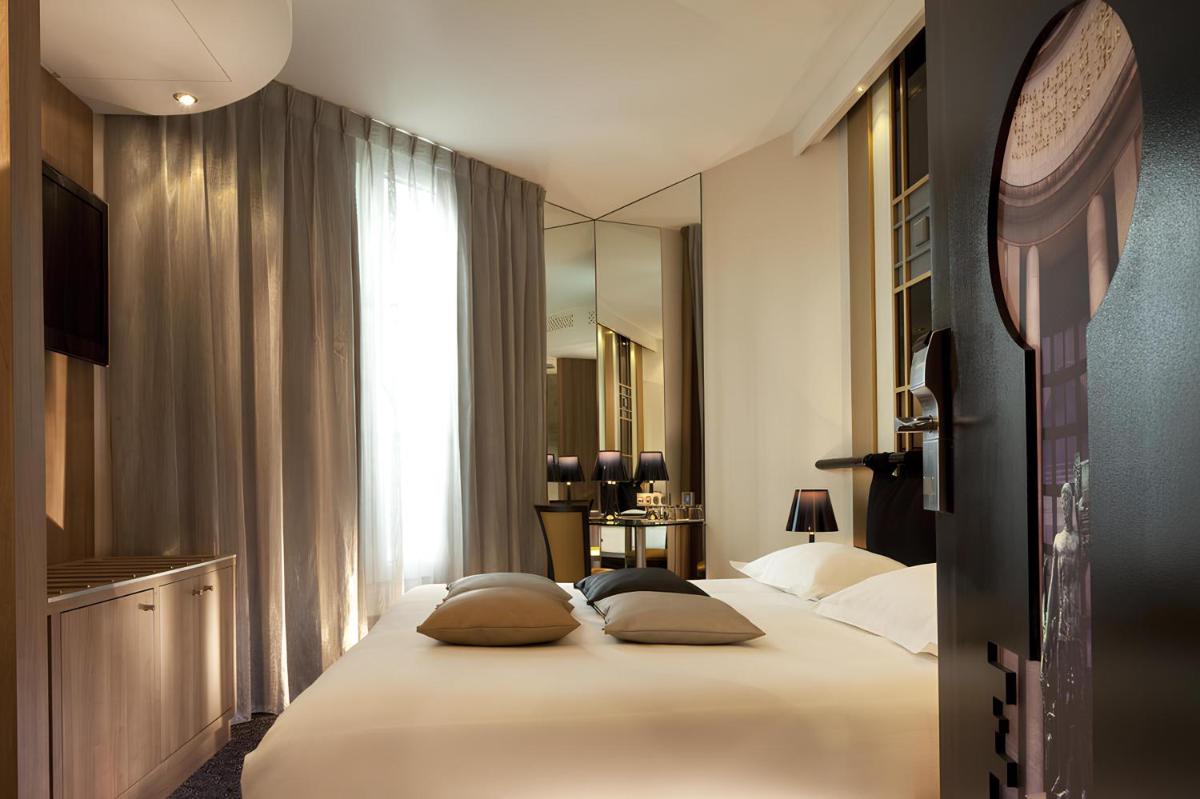 Un ou plusieurs lits dans un hébergement de l'établissement Secret de Paris - Hotel & Spa