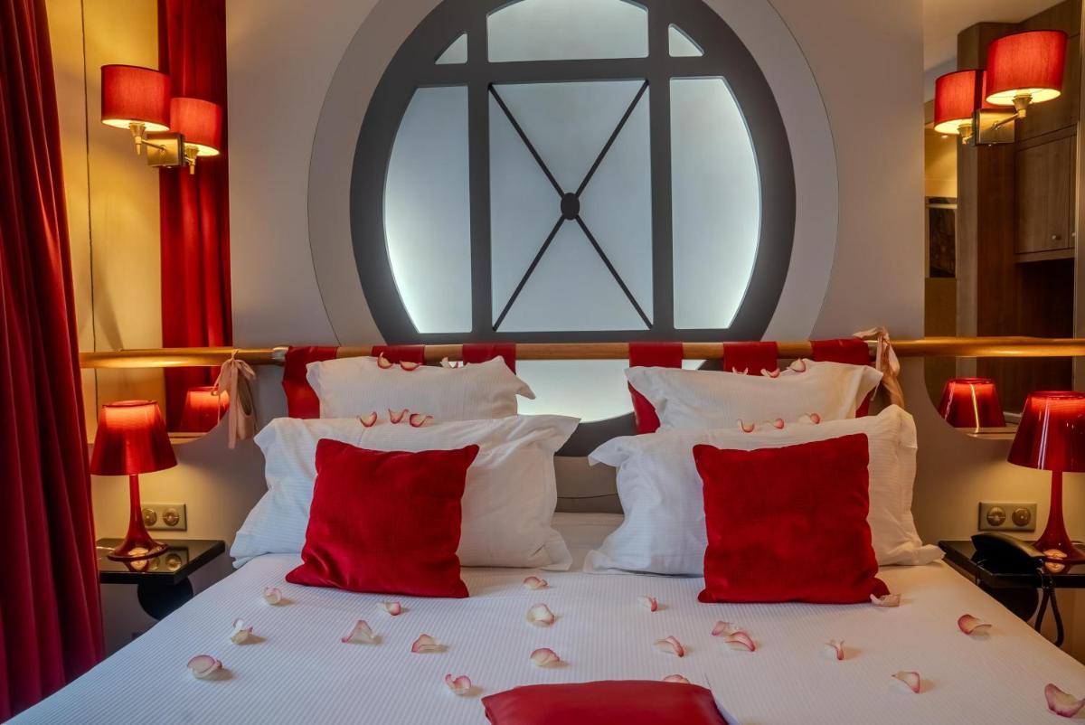 Un ou plusieurs lits dans un hébergement de l'établissement Secret de Paris - Hotel & Spa