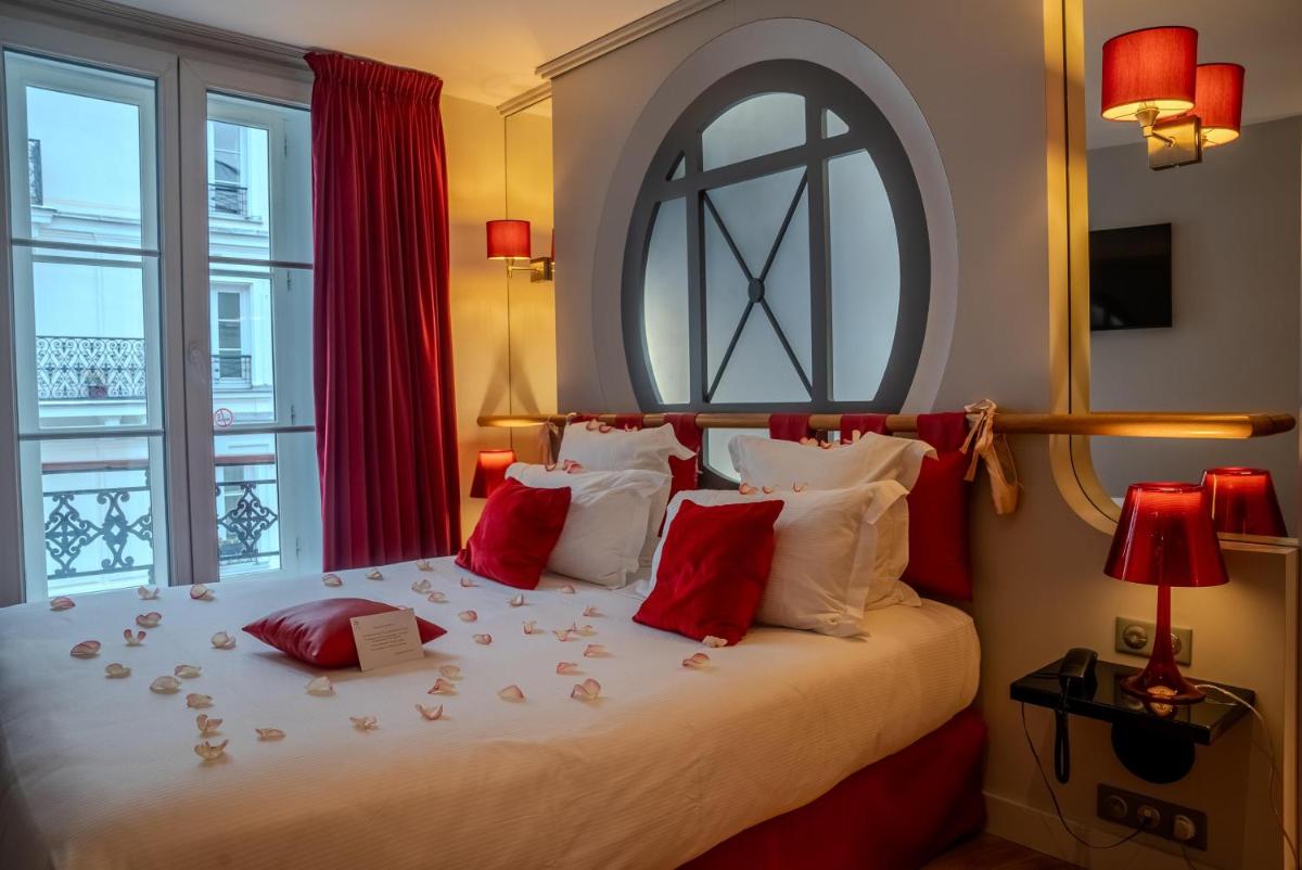 Un ou plusieurs lits dans un hébergement de l'établissement Secret de Paris - Hotel & Spa