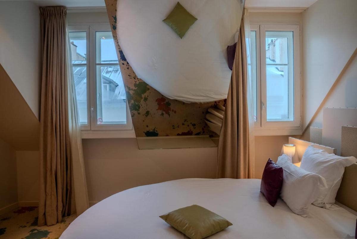 Un ou plusieurs lits dans un hébergement de l'établissement Secret de Paris - Hotel & Spa