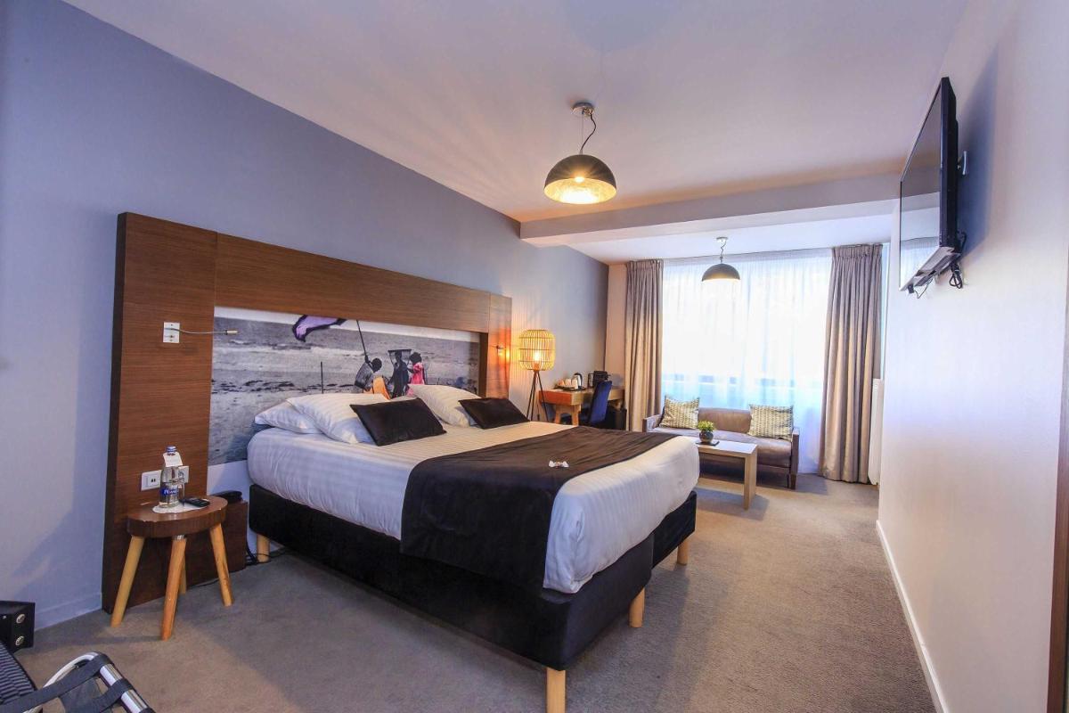 Un ou plusieurs lits dans un hébergement de l'établissement Best Western Hôtel Garden and Spa