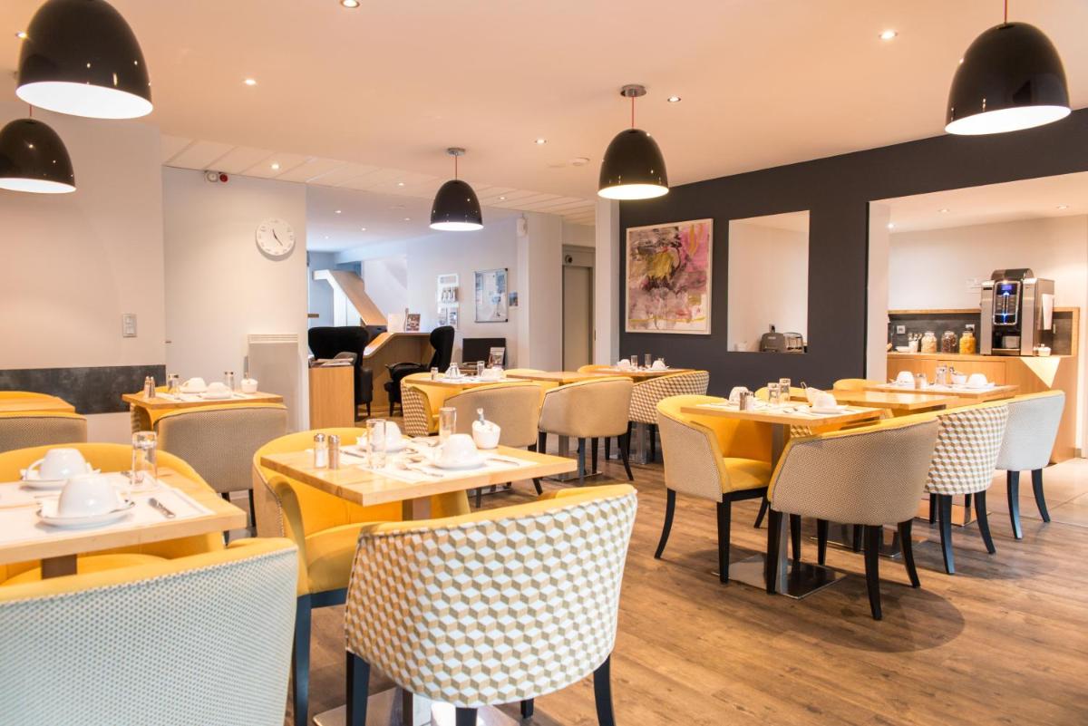 Restaurant ou autre lieu de restauration dans l'établissement Best Western Hôtel Garden and Spa