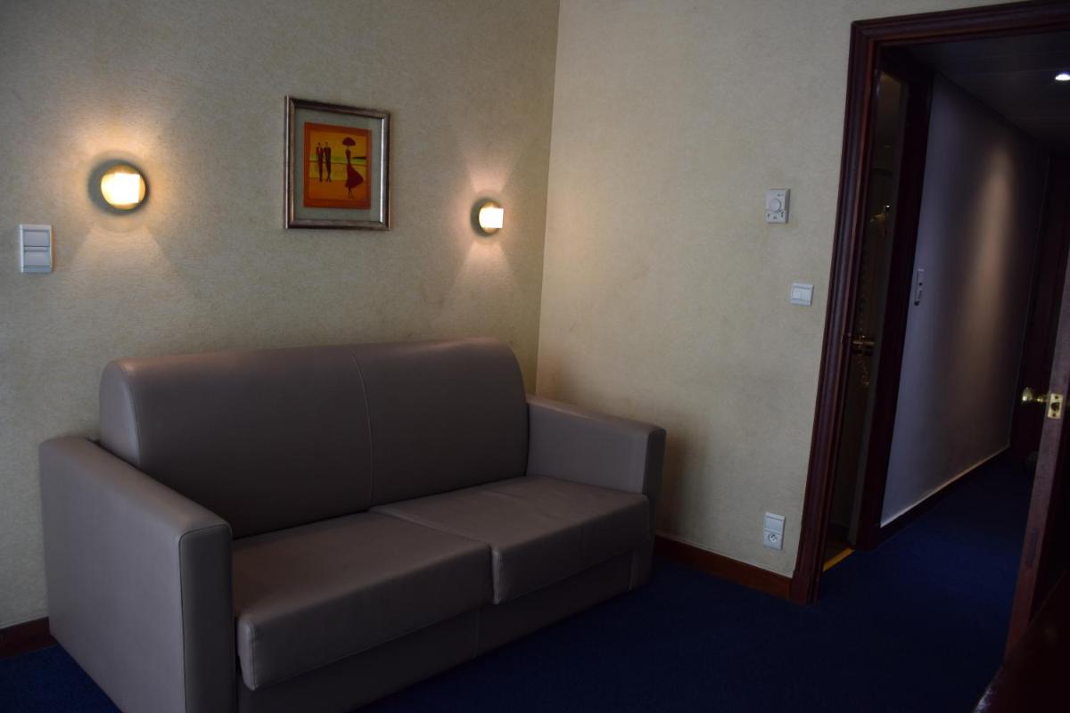 Coin salon dans l'établissement Splendid Hotel & Spa Nice