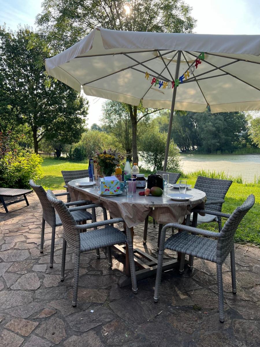 Elbferienhaus Lenzerwische - gemeinsames Urlauben an der Elbe mit privaten Badesee - alles inklusive - Housity
