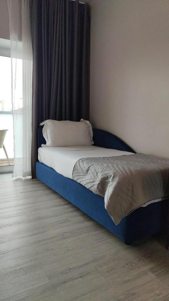 Uma cama ou camas num quarto em Hotel de Ilhavo Plaza & Spa