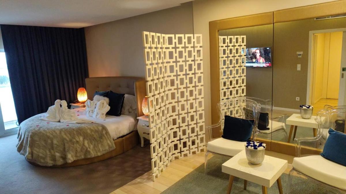 Uma cama ou camas num quarto em Hotel de Ilhavo Plaza & Spa
