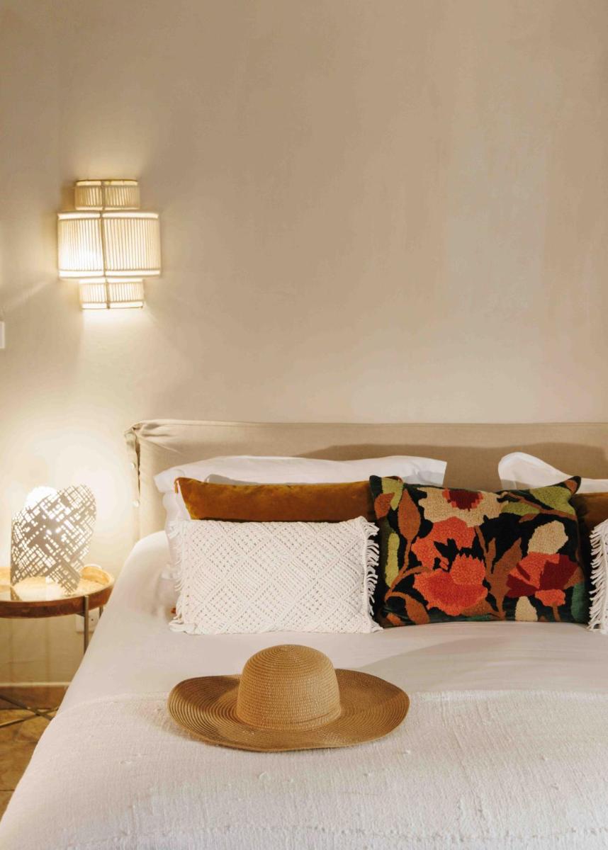 Un ou plusieurs lits dans un hébergement de l'établissement Hôtel La Dimora & Spa