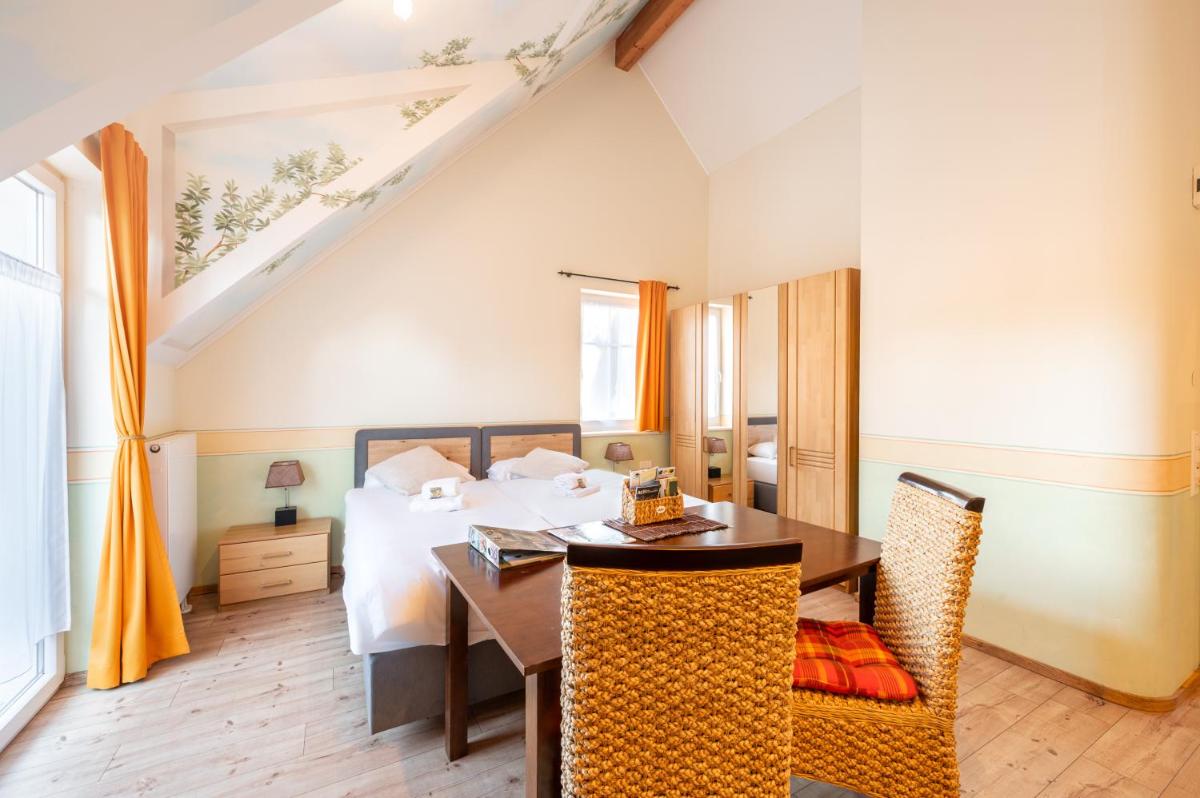 SCHUSTERjunge Aparthotel I Zentral I Studio Apartments I Küche & Bad I Parkplatz - Housity
