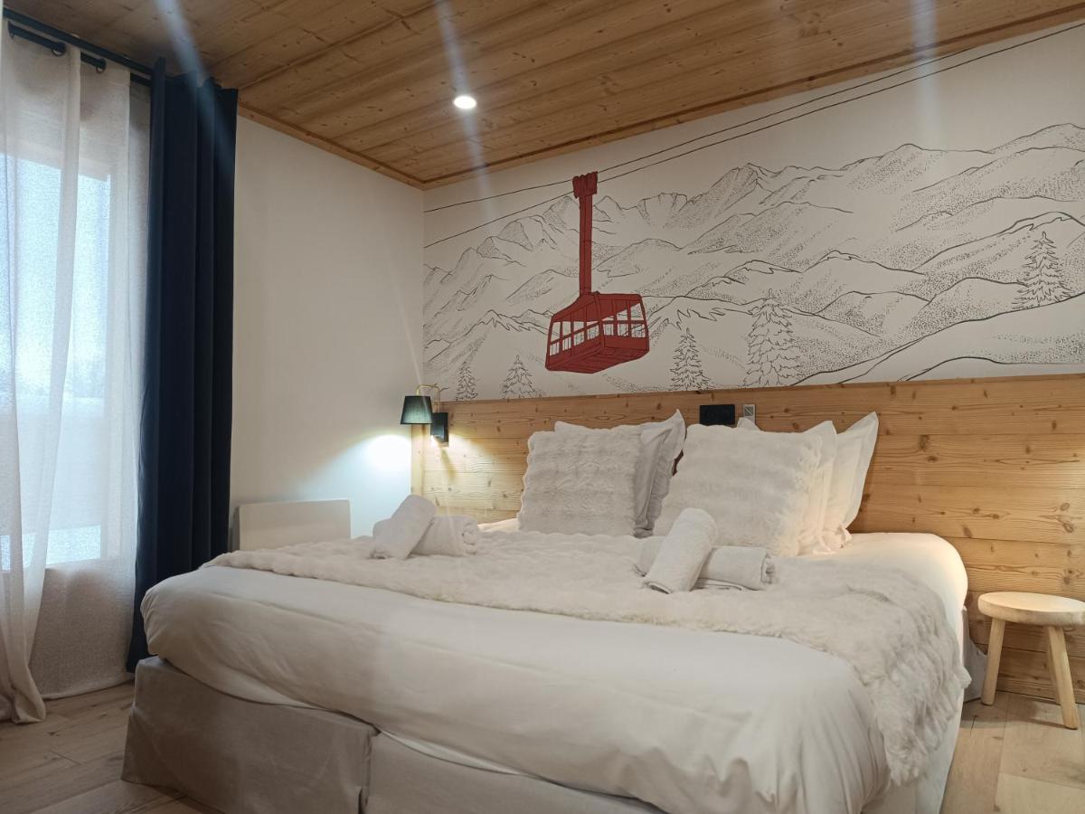 Un ou plusieurs lits dans un hébergement de l'établissement Hôtel Mont Thabor Serre Chevalier