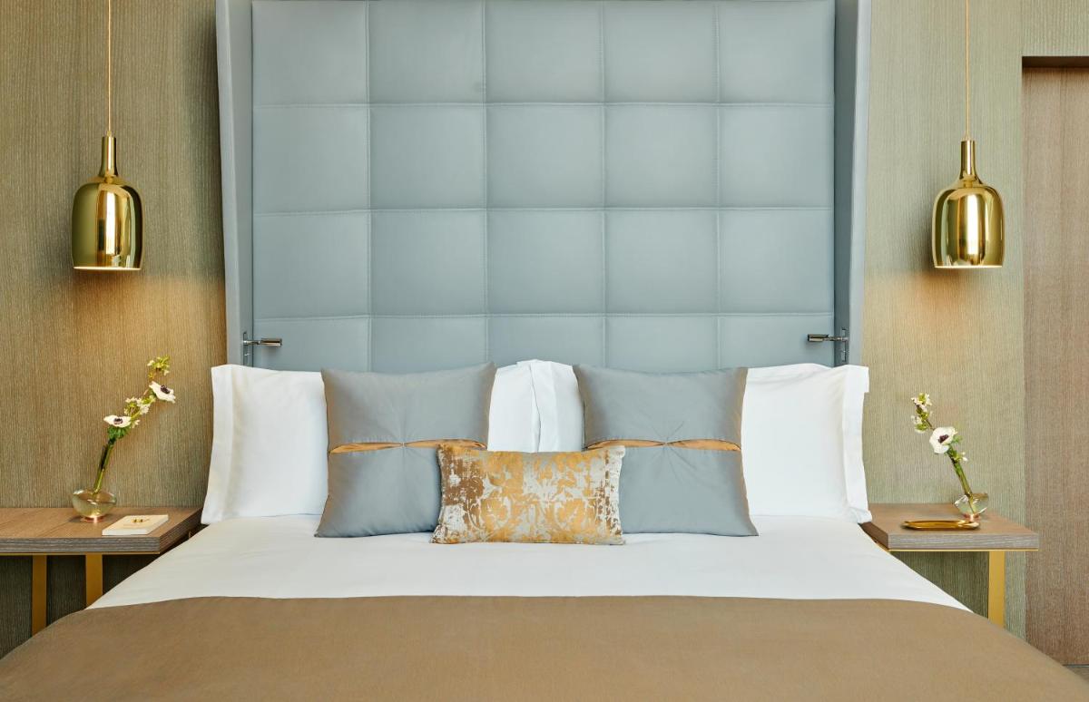 Un ou plusieurs lits dans un hébergement de l'établissement InterContinental Lyon - Hotel Dieu by IHG