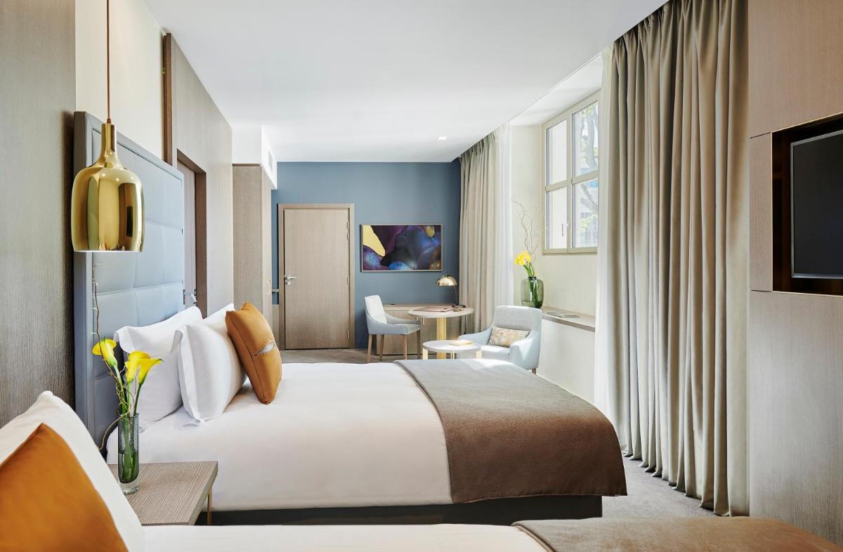 Un ou plusieurs lits dans un hébergement de l'établissement InterContinental Lyon - Hotel Dieu by IHG
