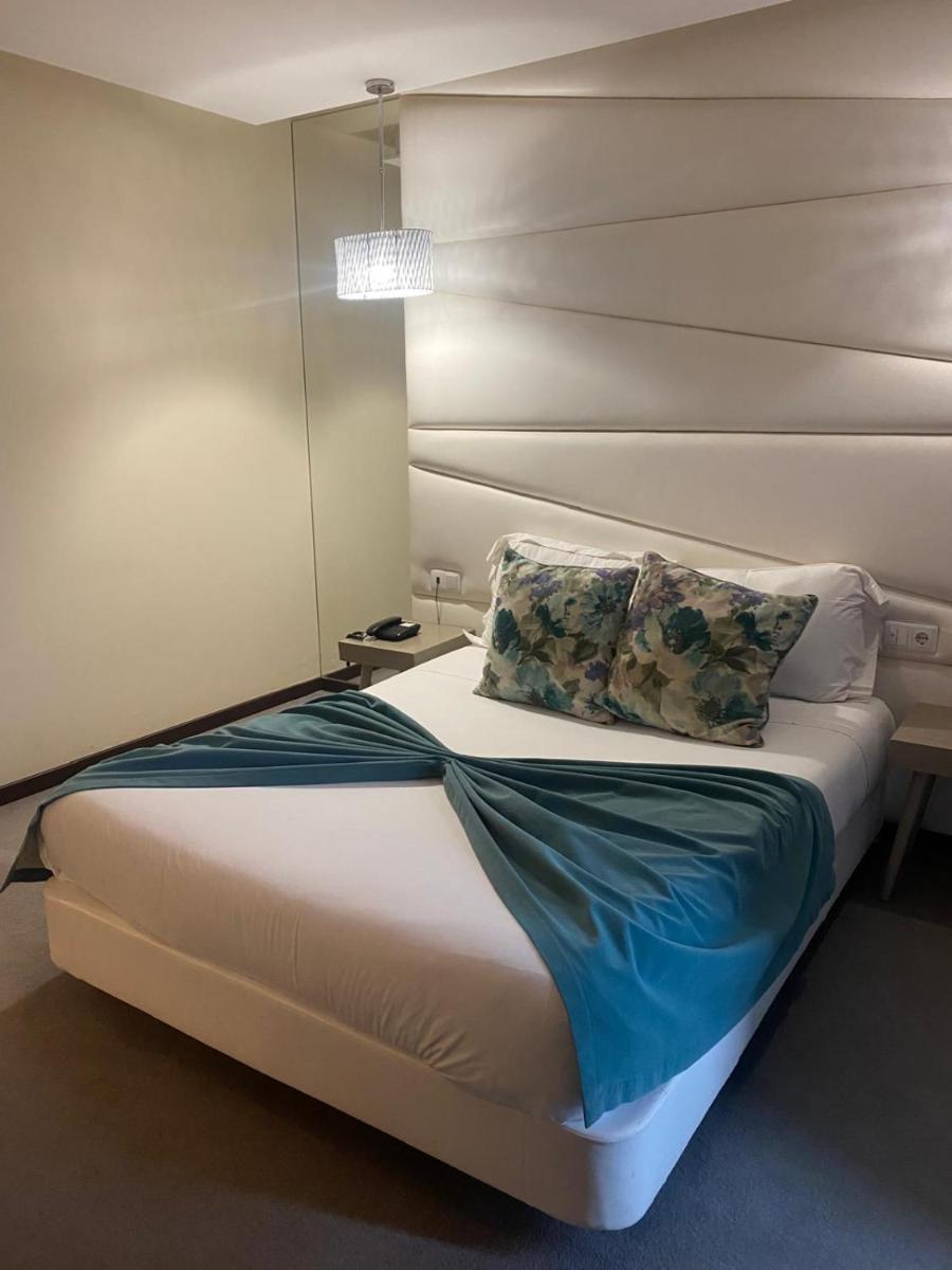 Uma cama ou camas num quarto em Hotel de Ilhavo Plaza & Spa