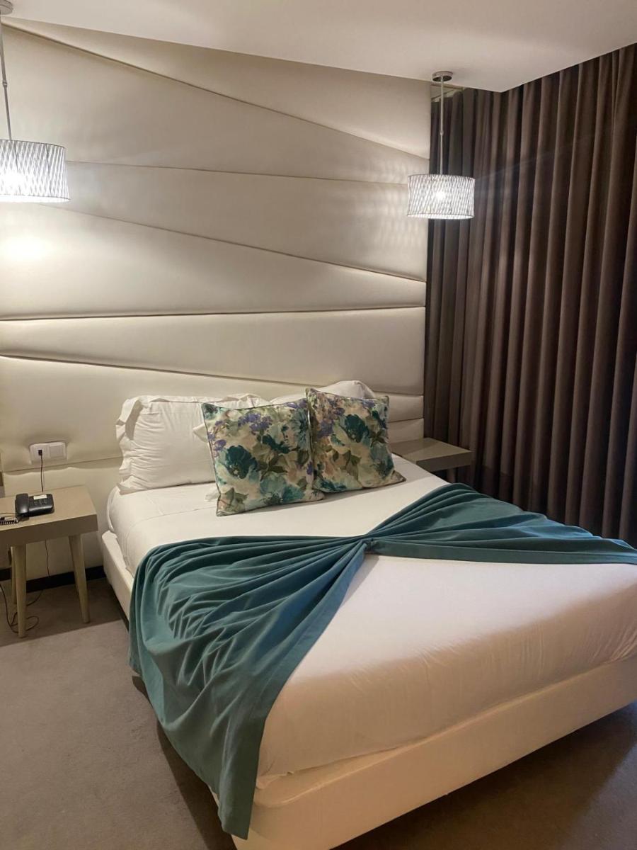 Uma cama ou camas num quarto em Hotel de Ilhavo Plaza & Spa