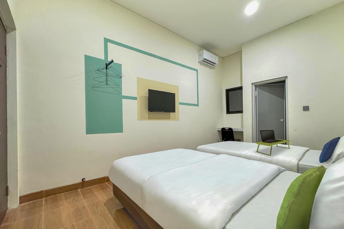 Urbanview Hotel Aloevera Pontianak by RedDoorz - Housity