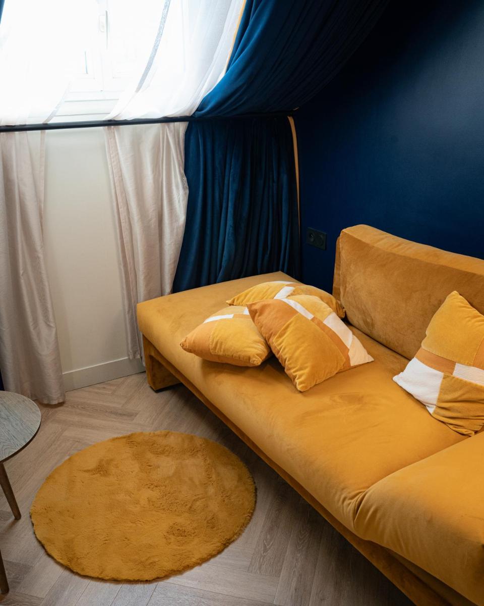 Coin salon dans l'établissement Hôtel Artemisia Montmartre