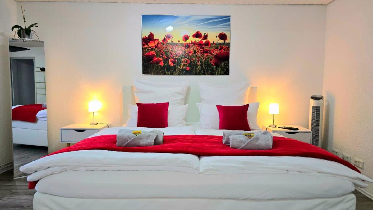 HAPPY HOMES RED - Dein stylisches Maisonette-Apartment mit Wow-Effekt! - Housity