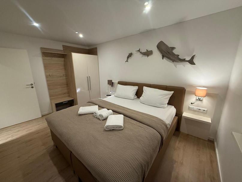 Ein Bett oder Betten in einem Zimmer der Unterkunft Schwimmende Häuser im BALTIC SEA RESORT
