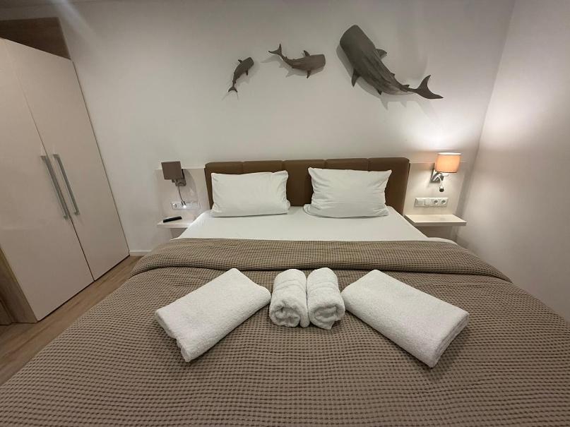 Ein Bett oder Betten in einem Zimmer der Unterkunft Schwimmende Häuser im BALTIC SEA RESORT