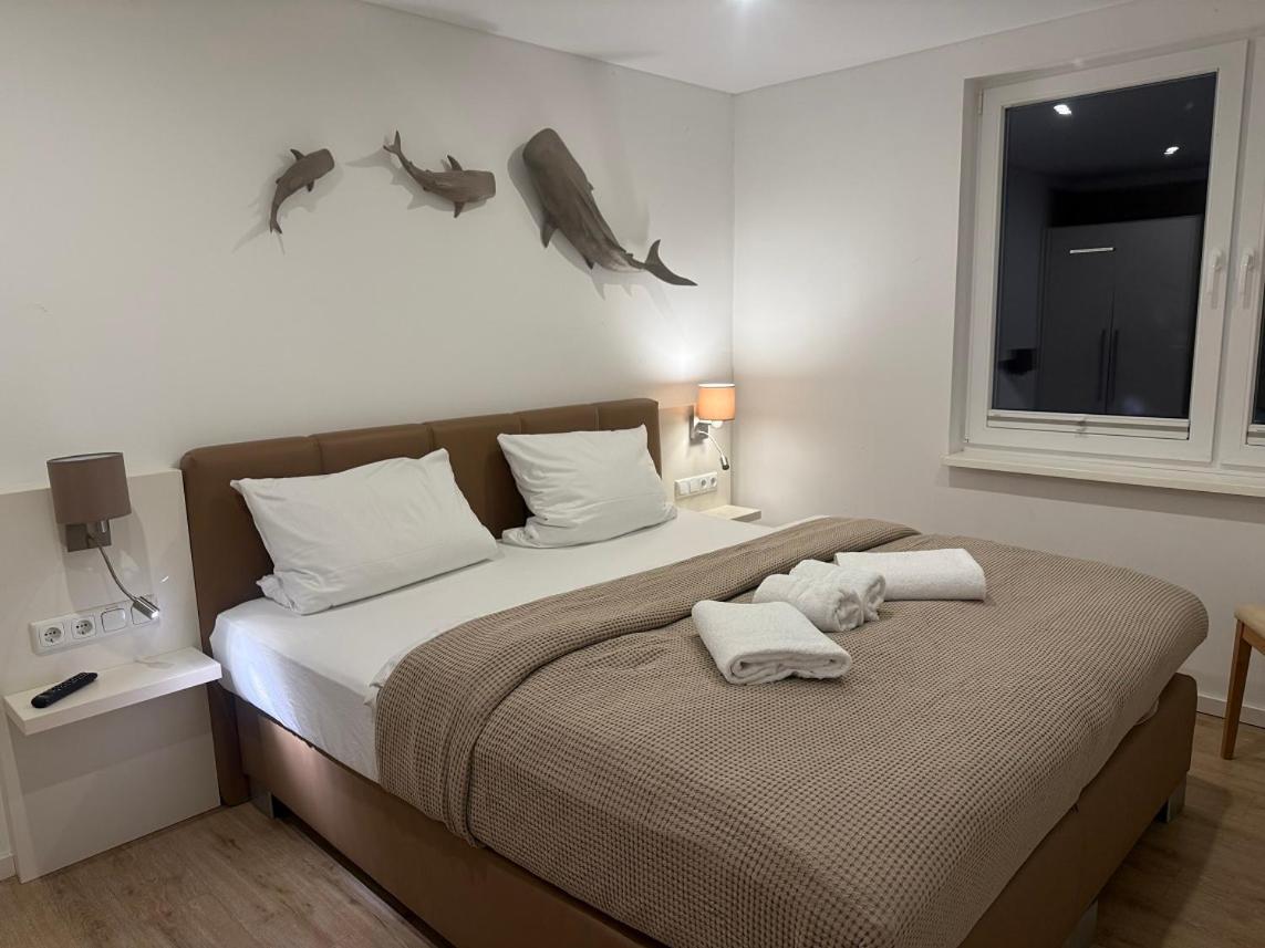 Ein Bett oder Betten in einem Zimmer der Unterkunft Schwimmende Häuser im BALTIC SEA RESORT