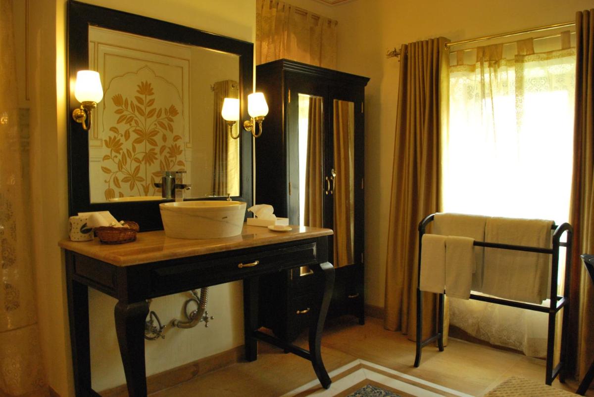 a bathroom with a sink and a mirror at Royal Heritage Haveli - By Leisure Hotels in Jaipur
