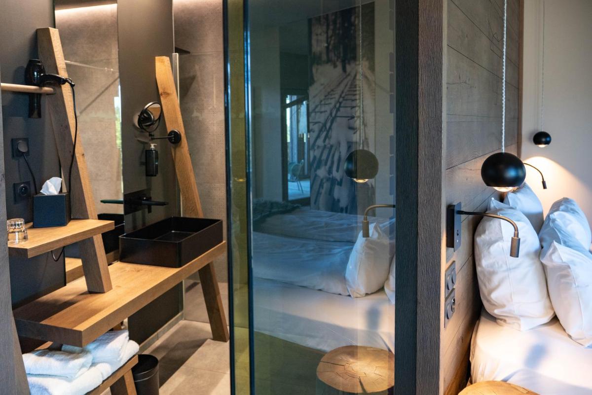 Salle de bains dans l'établissement Chalet Hôtel & Spa Le Collet