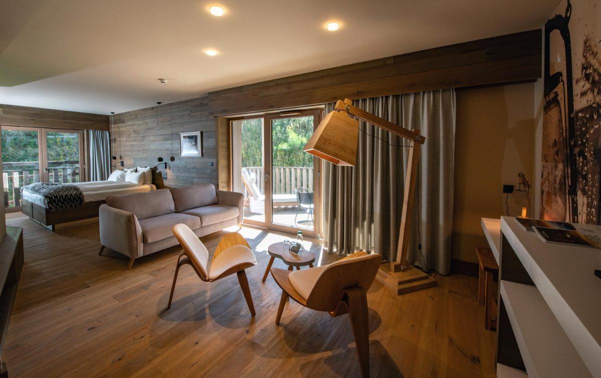 Coin salon dans l'établissement Chalet Hôtel & Spa Le Collet